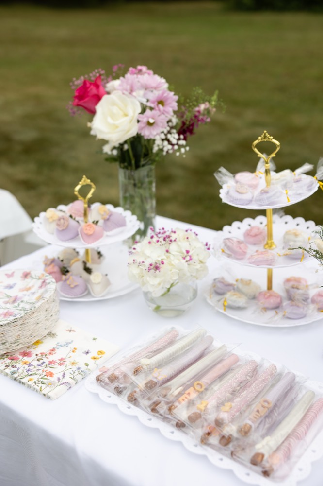 A Sprinkle Crew dessert table for a first birthday
